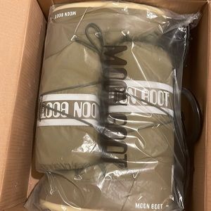 Size 10 and 1/2 Nylon Moon Boots never worn Ski-trip was canceled.